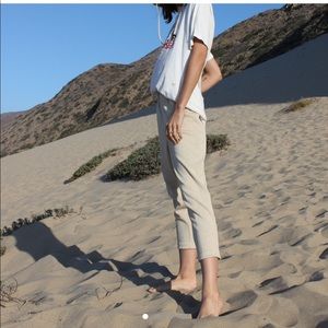 High waisted tan travel trousers